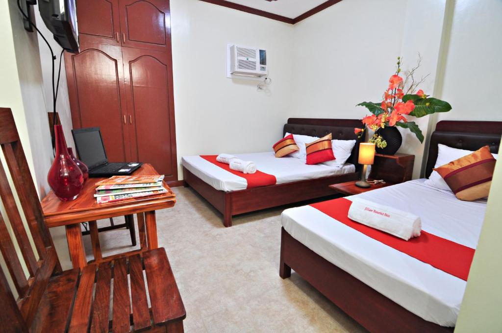 Jilian Tourist Inn Puerto Princesa Zimmer foto